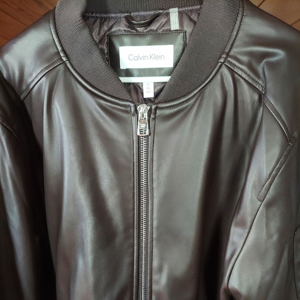 Brown, Calvin Kline leather jacket.